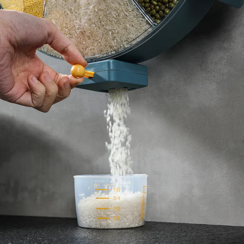 Wall-mounted rotating grain dispenser with six compartments, blue-yellow colour, showing 360° rotation feature