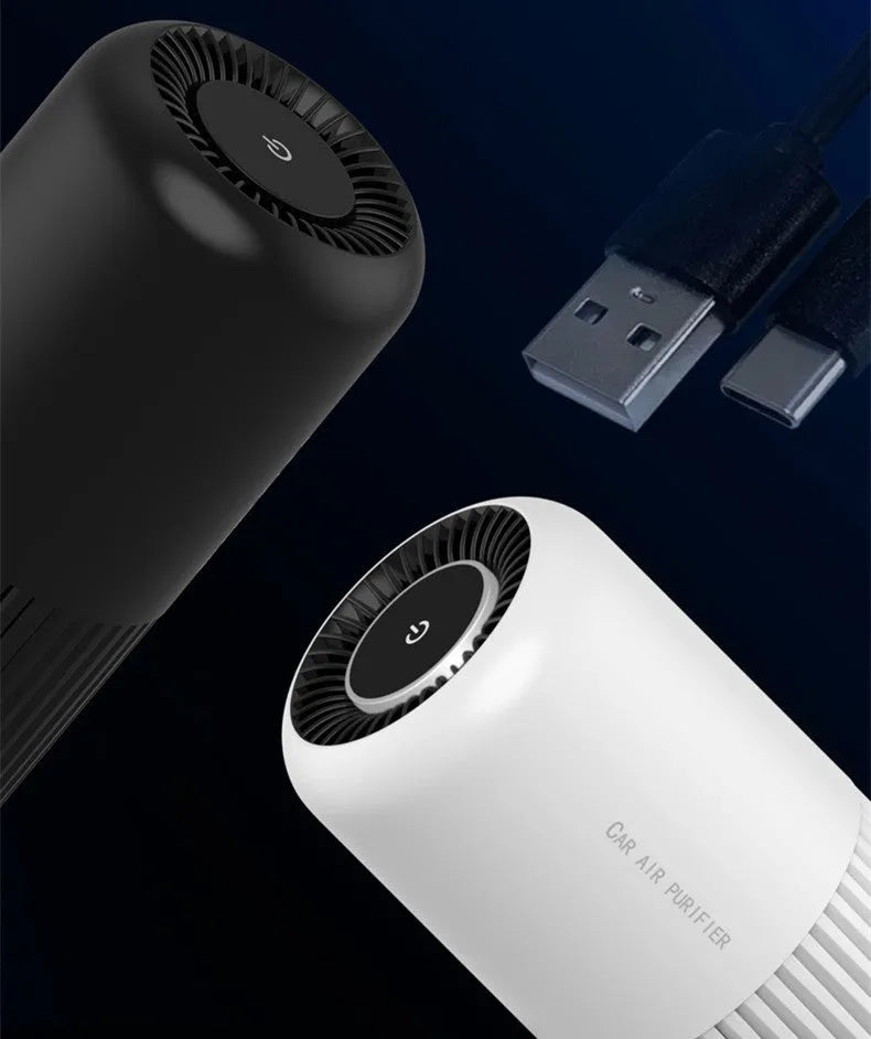 Compact black USB air purifier for car and desktop use with HEPA and UV filtration.