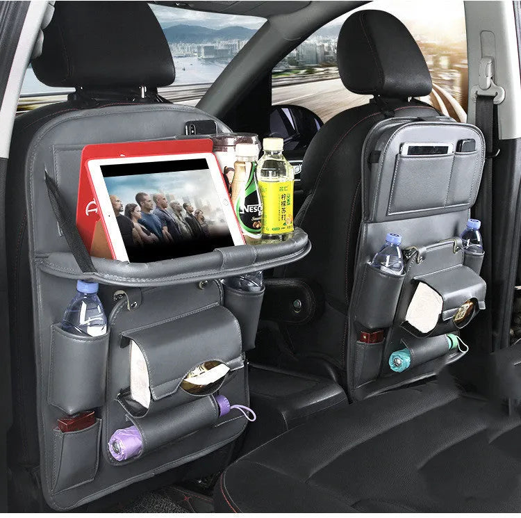 PU leather car seat back organiser bag with zipped main pocket and mesh side holders.