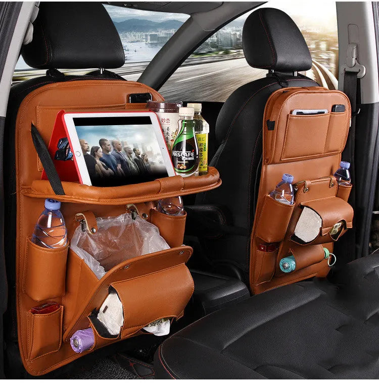 PU leather car seat back organiser bag with zipped main pocket and mesh side holders.