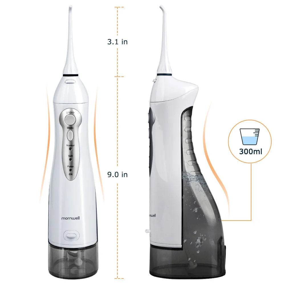 White portable oral irrigator with large 330ml water tank and multiple nozzles on a bathroom counter