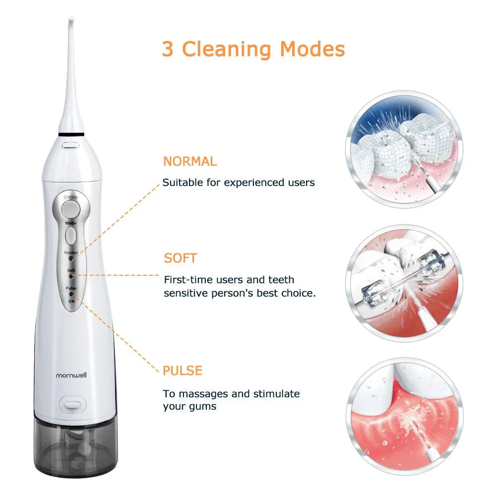 White portable oral irrigator with large 330ml water tank and multiple nozzles on a bathroom counter
