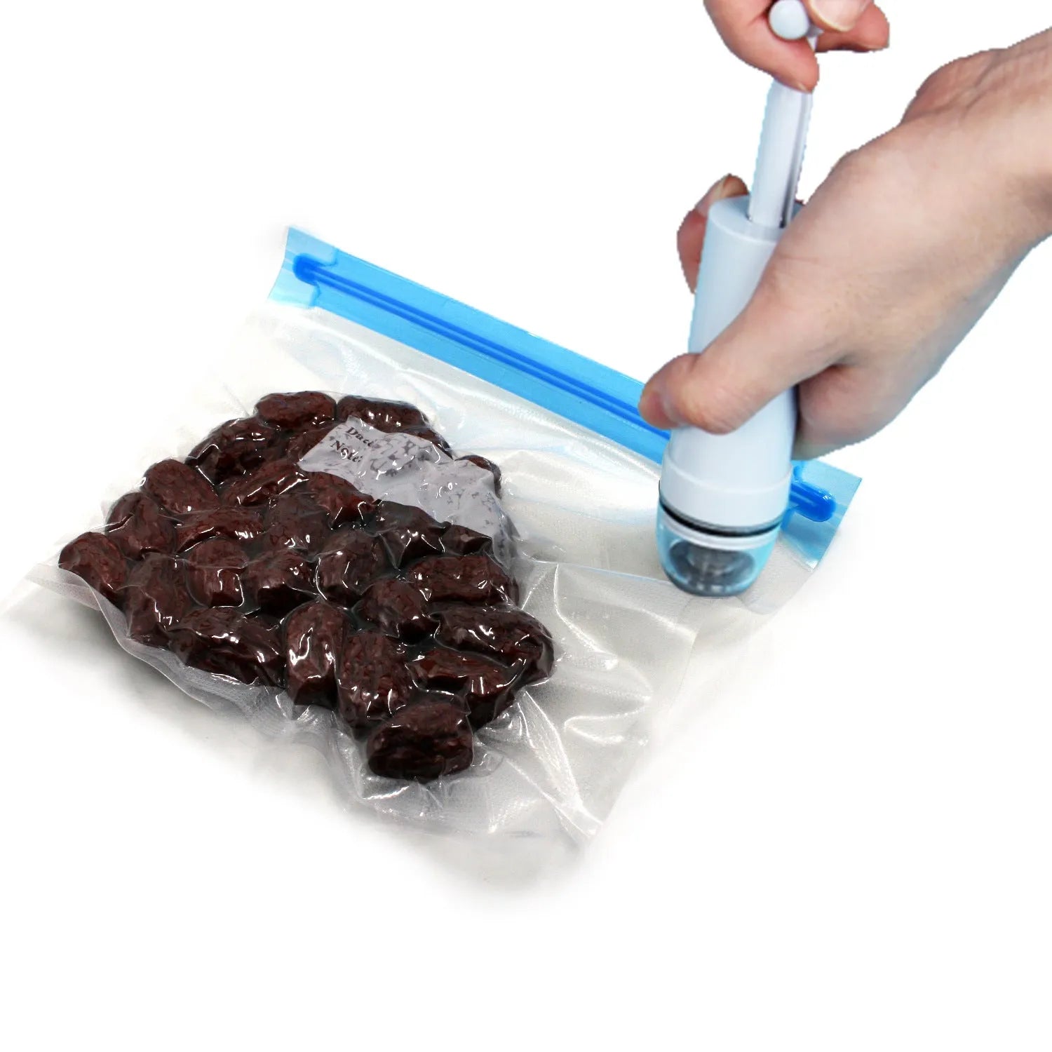 Green and grey manual vacuum compression storage bag with a hand pump on a white background.