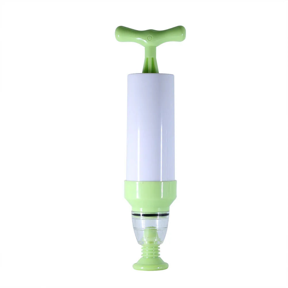 Green and grey manual vacuum compression storage bag with a hand pump on a white background.