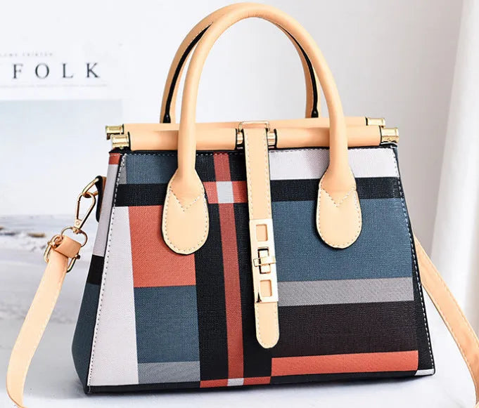 Women's large capacity PU leather Boston handbag in horizontal square shape with soft handle and belt decoration