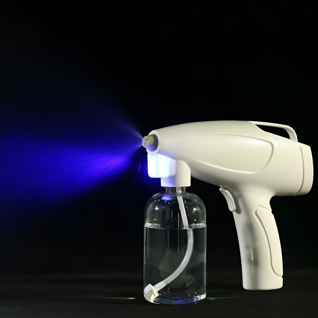 White handheld cordless electric spray gun with USB-C charging port on a plain background.