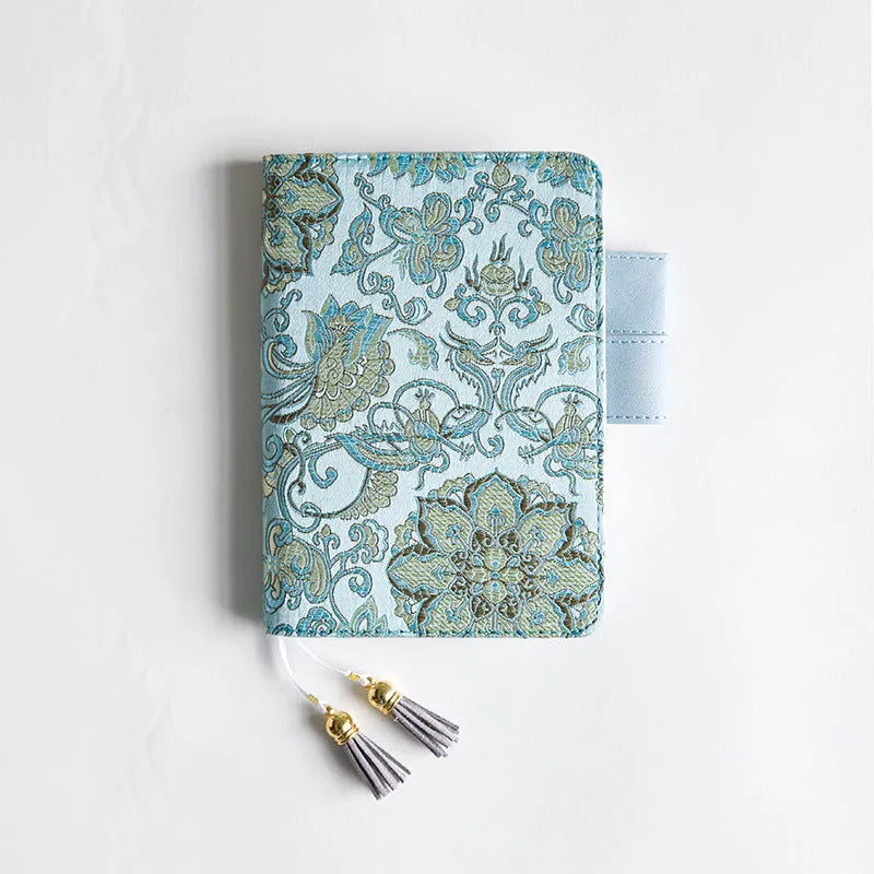 Fabric-covered Flying Blue Flower notebook in A5 and A6 sizes with 100g paper.