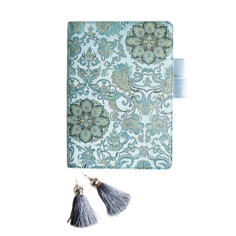 Fabric-covered Flying Blue Flower notebook in A5 and A6 sizes with 100g paper.