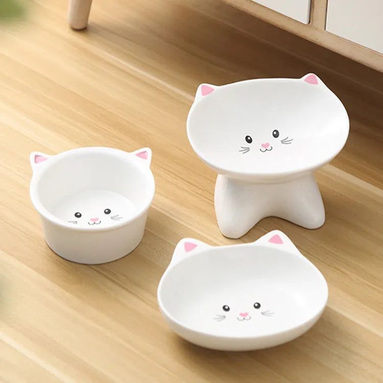 Ceramic small cat face shape pet food bowl in white porcelain, suitable for cats and small dogs
