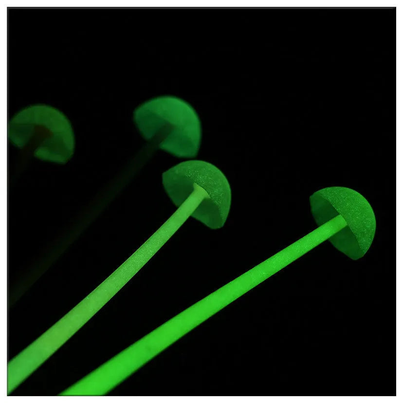 Luminous mushroom silicone gel pen with black core and cap on a white background