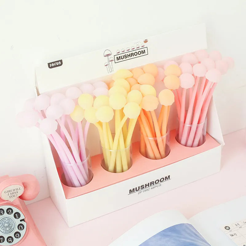 Luminous mushroom silicone gel pen with black core and cap on a white background