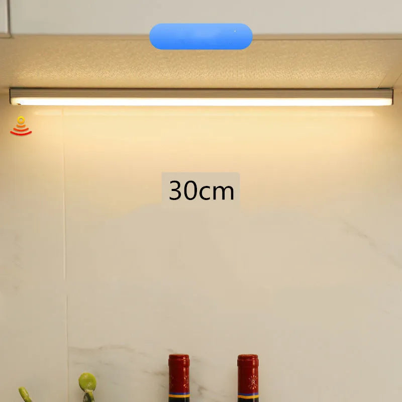 Hand-scanning induction wireless LED cabinet lamp strip with magnetic mounting in white or yellow