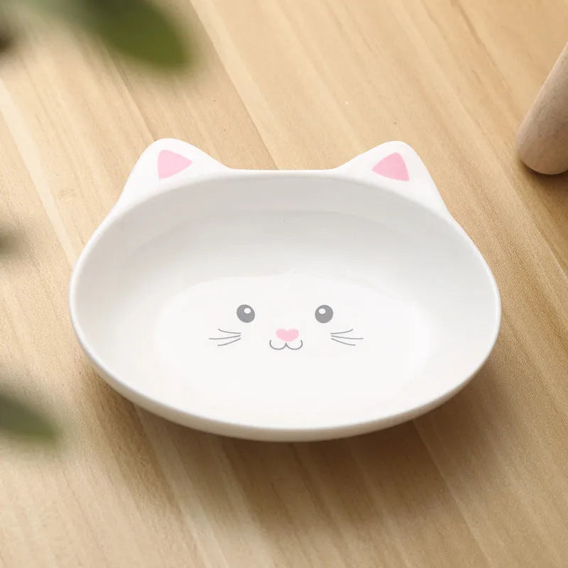 Ceramic small cat face shape pet food bowl in white porcelain, suitable for cats and small dogs