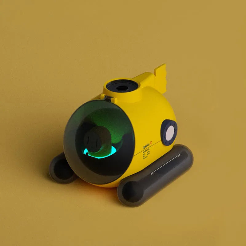 Ultrasonic fog diffuser humidifier with colour LED light in Astronaut design on a desk