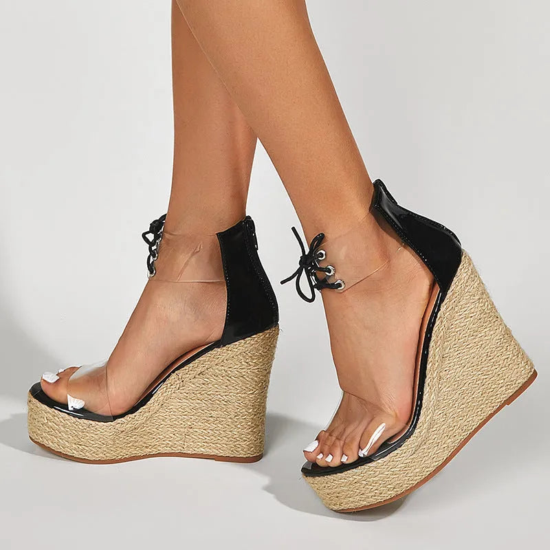 Black women's wedge sandals with hemp rope detail and high 8cm heel on a light background.