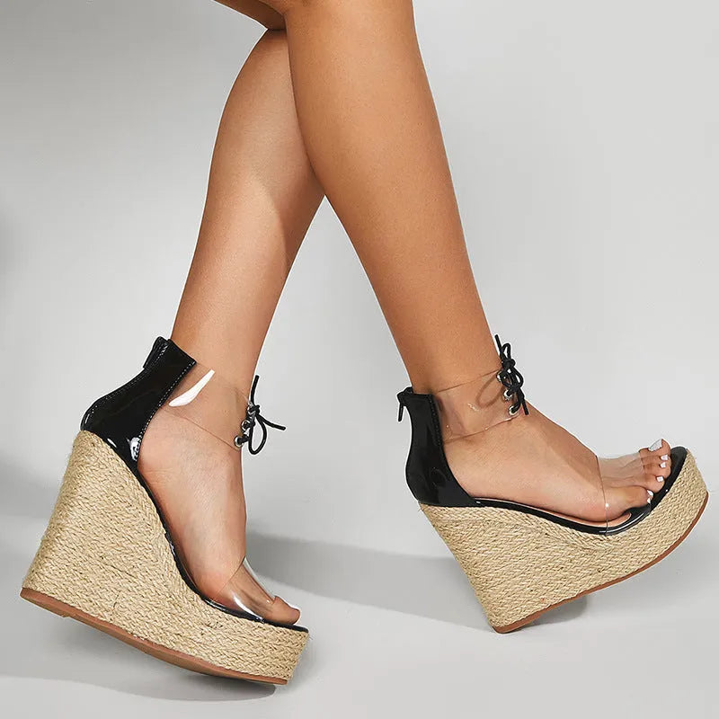 Black women's wedge sandals with hemp rope detail and high 8cm heel on a light background.