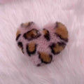 Leopard print plush heart keychain with imitation rex rabbit fur ball on a white background
