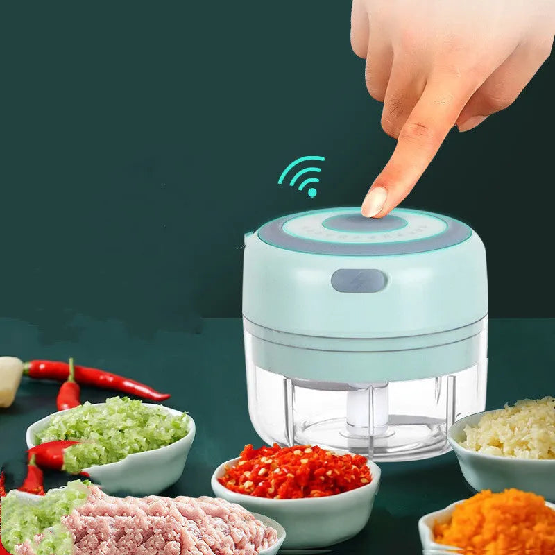 Mini electric garlic chopper with USB charging, stainless steel blade, and plastic cup