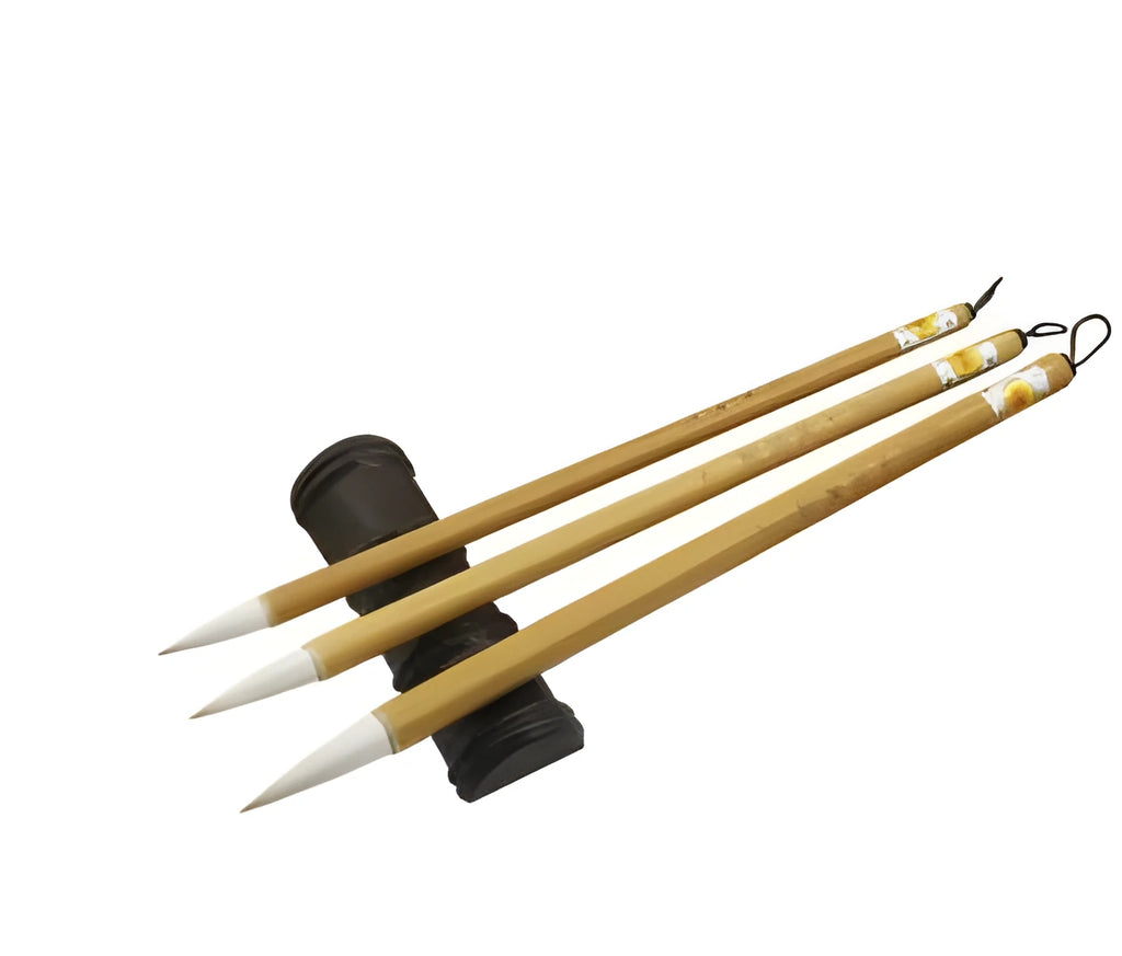 Three Chinese calligraphy brushes with bamboo handles and woolen bristles in large, medium, and small sizes