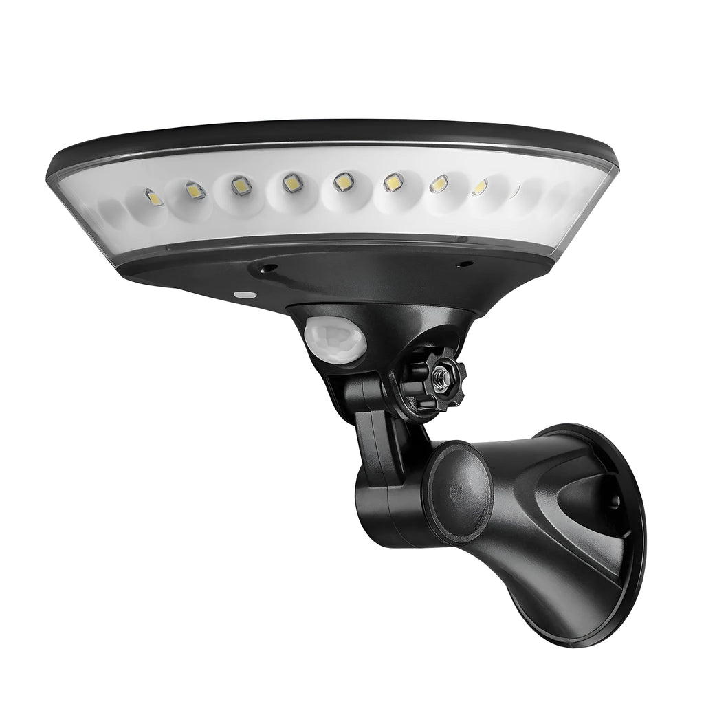 White 360-degree solar-powered security light with motion sensor on wall.