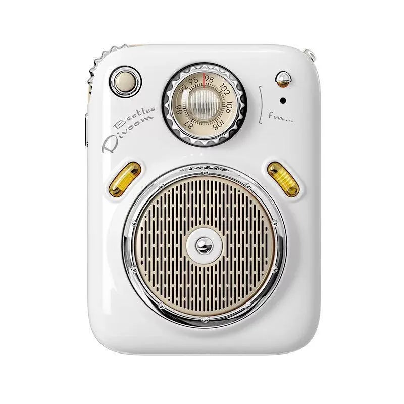 Compact smart Bluetooth and FM radio speaker in green, showing front view with speaker grill.
