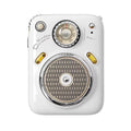 Compact smart Bluetooth and FM radio speaker in green, showing front view with speaker grill.