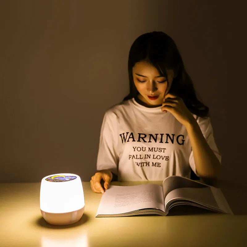 Pruixin projector night light showing star and love patterns projected on a bedroom ceiling.