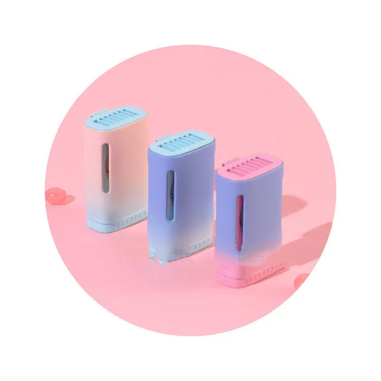 Compact jelly hanging neck fan in mint peach colour, showing USB port and neck strap.
