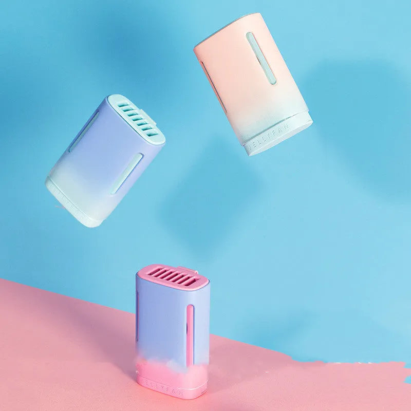 Compact jelly hanging neck fan in mint peach colour, showing USB port and neck strap.