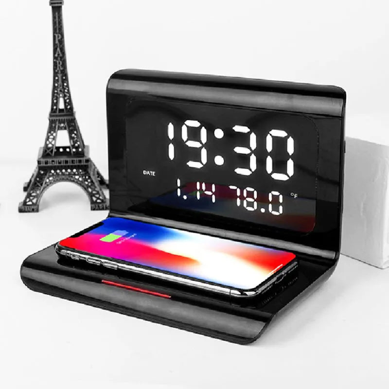 Wireless charger alarm clock showing calendar display with temperature and humidity readings