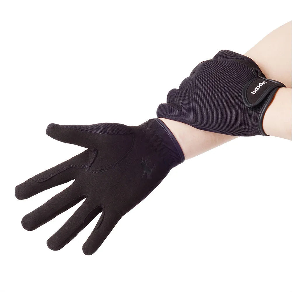 Professional horse riding gloves in brown and black with velcro strap adjustment for equestrian use