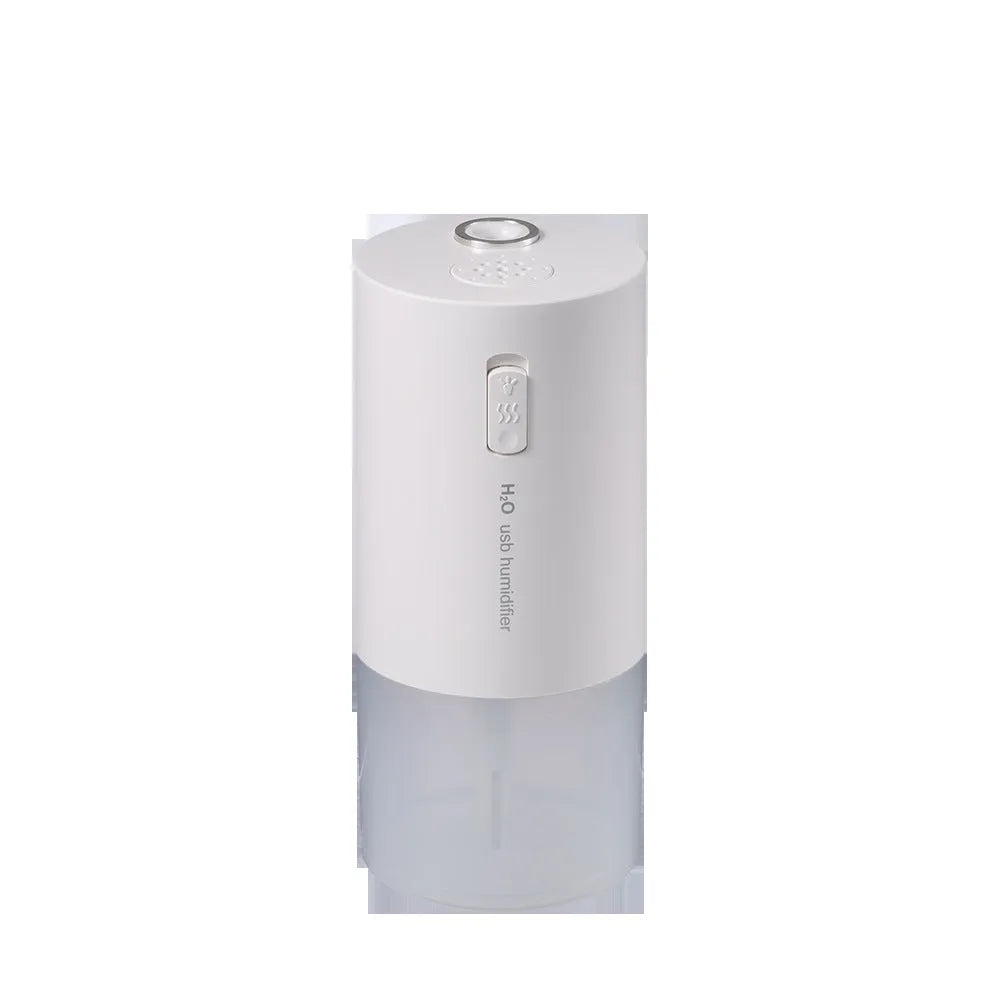 Blue columnar USB desktop humidifier with aromatherapy function on a wooden table