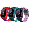 Green children's smart watch with touch screen and GPS on a wrist.