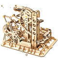 Wooden three-dimensional puzzle film projector with hand crank and gear wheel assembly