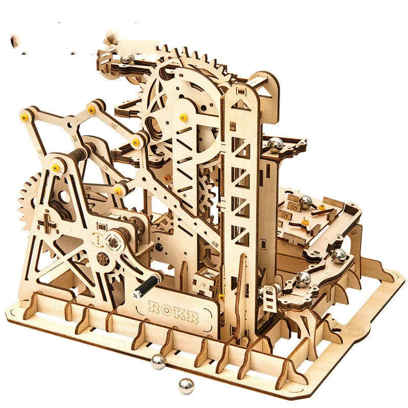 Wooden three-dimensional puzzle film projector with hand crank and gear wheel assembly