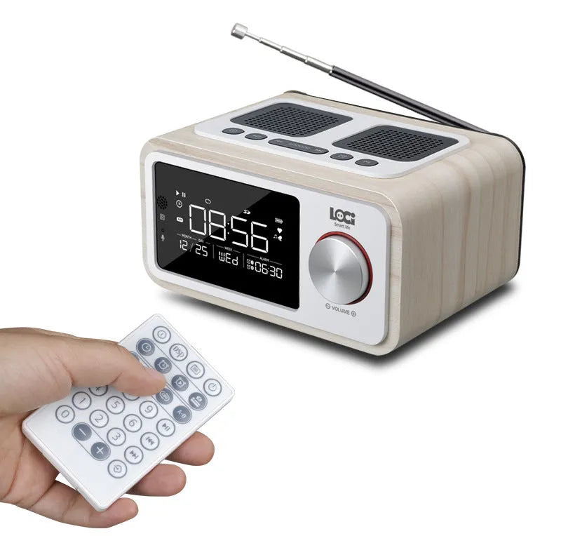Wooden Bluetooth speaker alarm clock radio in golden oil colour on a bedside table.