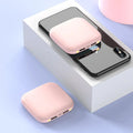 Compact black 20000mAh power bank with LED flashlight on a white background.