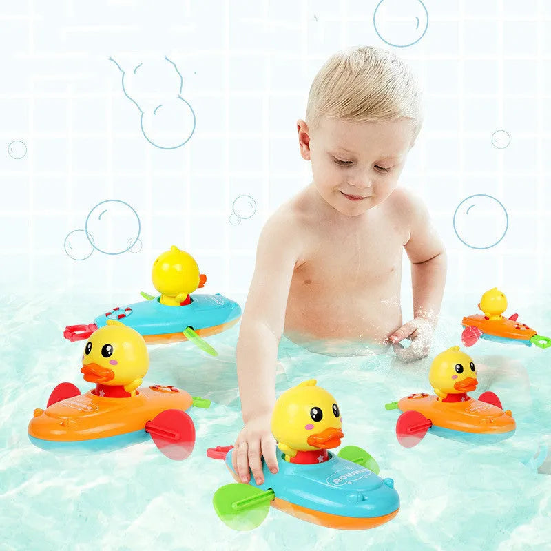 Yellow plastic wind-up swimming bath toys with rotating blades for children's bath time