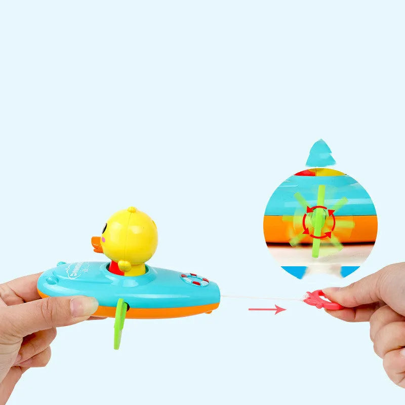 Yellow plastic wind-up swimming bath toys with rotating blades for children's bath time