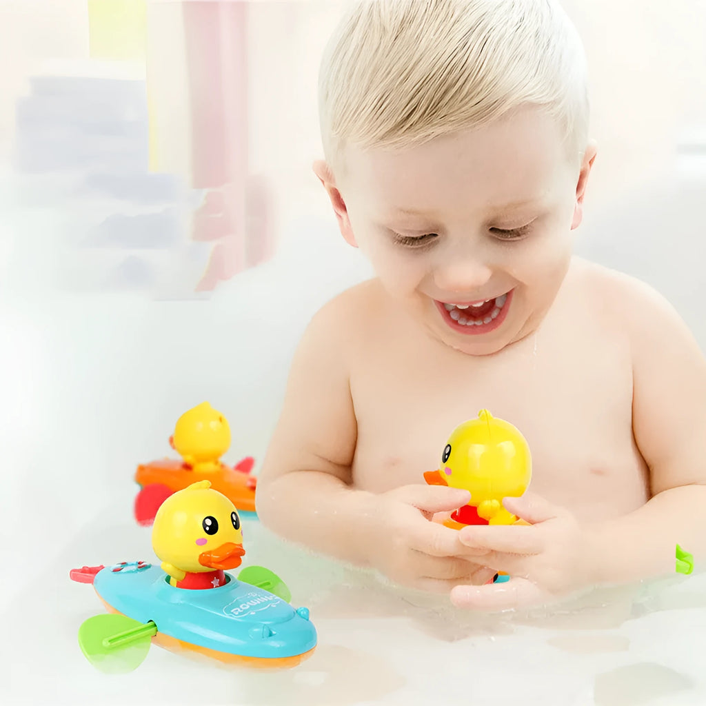 Yellow plastic wind-up swimming bath toys with rotating blades for children's bath time