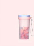 Portable pink USB rechargeable electric juicer cup with pulp box, shown with dimensions