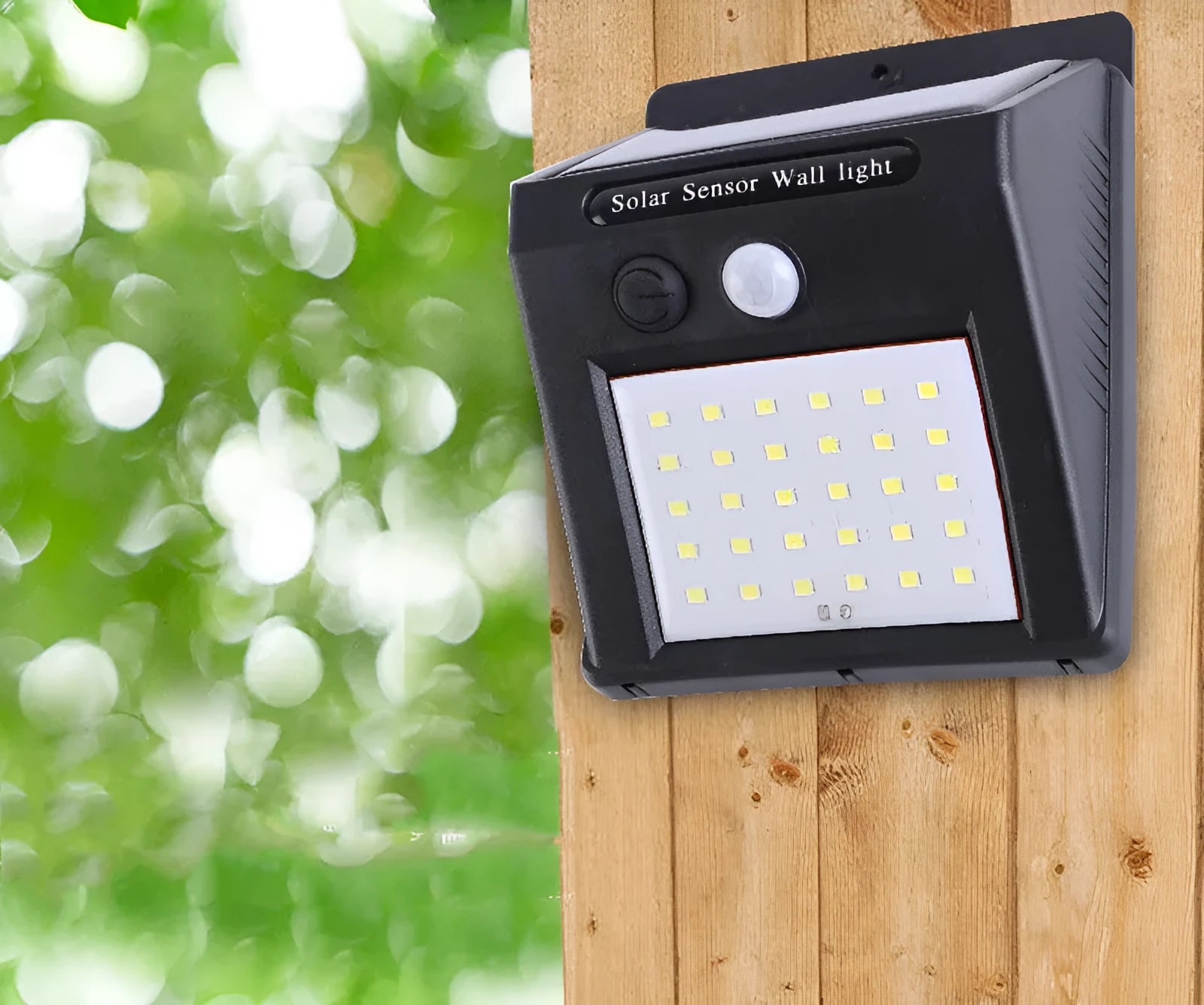 A white solar-powered garden lamp with LED lights and a solar panel on top, standing in a garden.