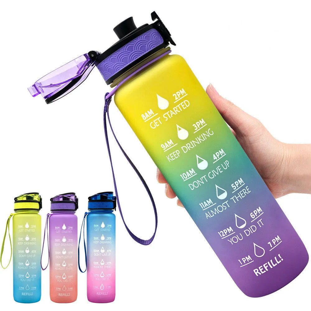 1L Tritan sports water bottle with time markers and flip-top lid in blue-red gradient colour