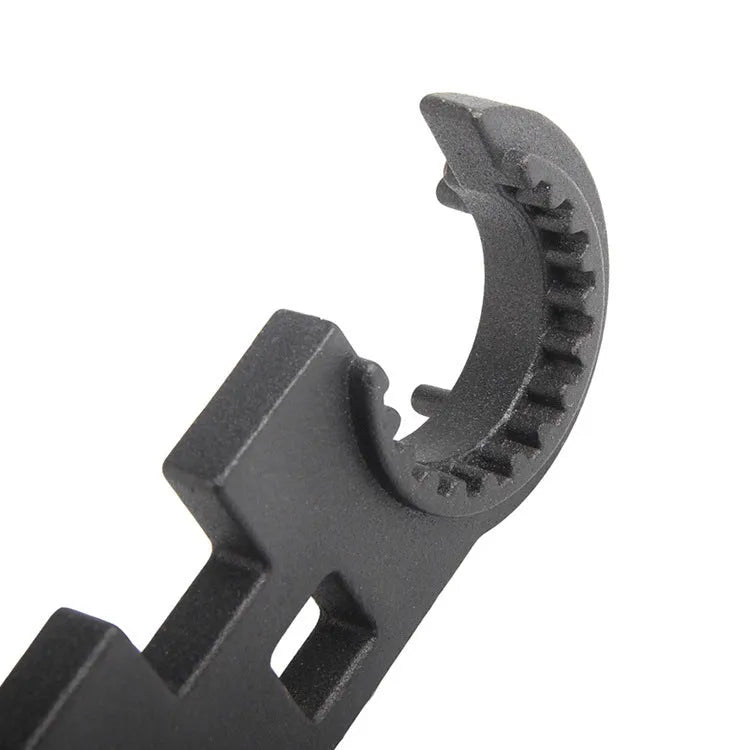 Black all-steel AR-15 M4 multi-function combination wrench for armourer use.