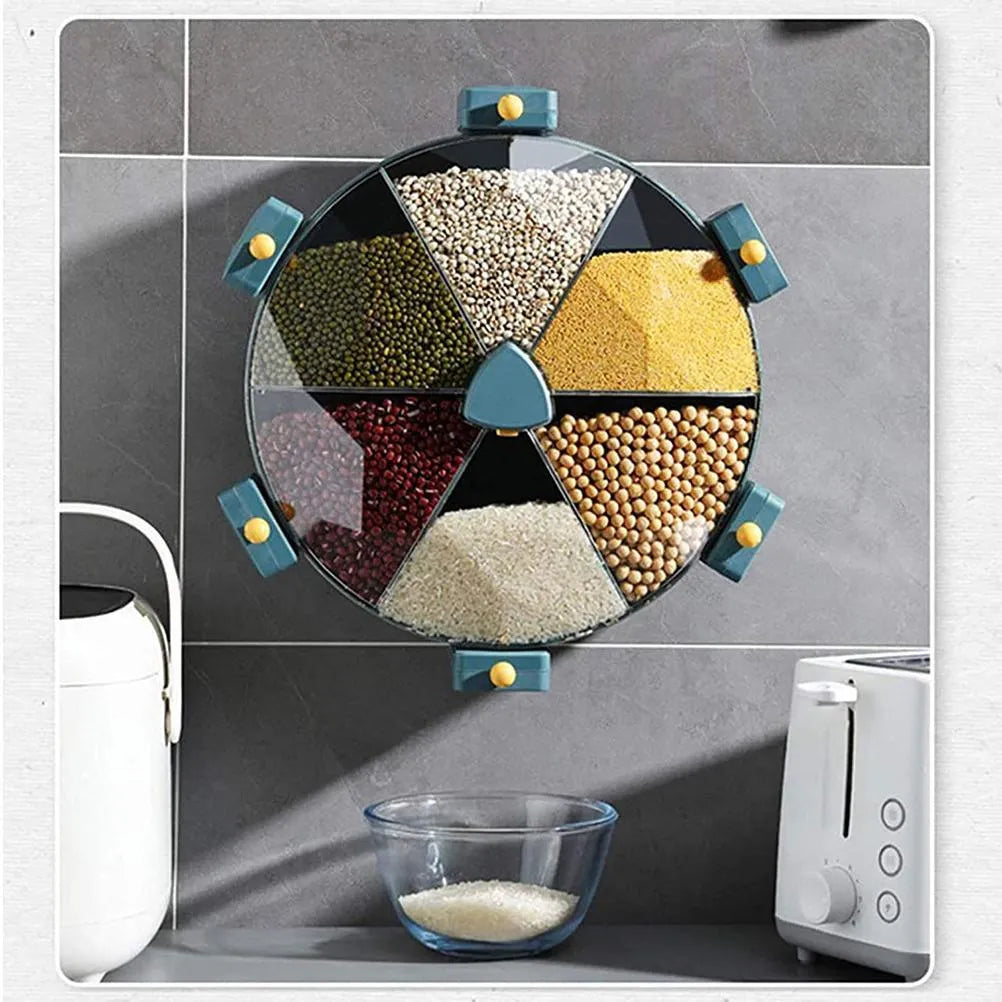 Wall-mounted rotating grain dispenser with six compartments, blue-yellow colour, showing 360° rotation feature