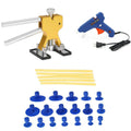 Car dent repair puller kit with glue gun and adhesive sticks in carton packaging