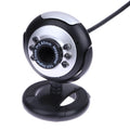 USB computer webcam with six white LED lights and a manual focus ring on the front.