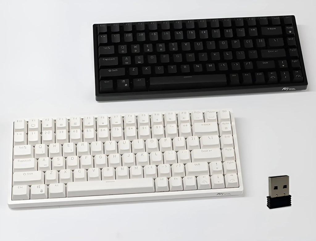 White 84-key mechanical keyboard with white backlighting and red switches on a desk