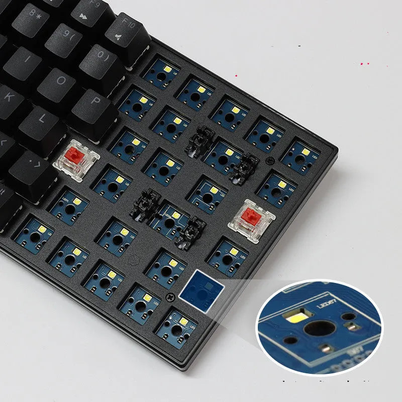 White 84-key mechanical keyboard with white backlighting and red switches on a desk