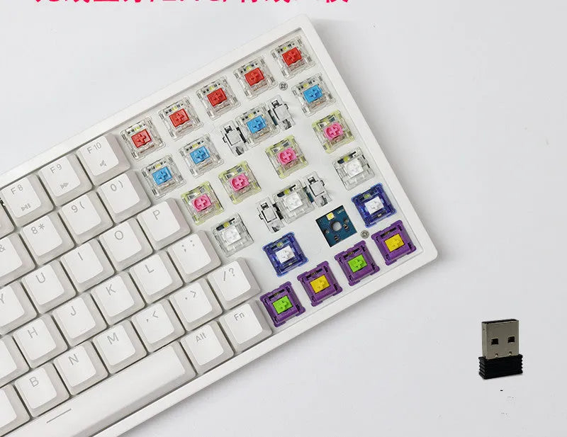 White 84-key mechanical keyboard with white backlighting and red switches on a desk